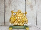 Phật di lạc vàng bóng gánh hai thúng tiền vàng đứng trên đế thuỷ tinh LN191